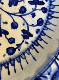 A blue and wite Iznik dish with floral design, Turkey, late 16th C.